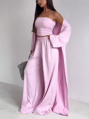 Blush pink ruched tube top, wide leg pants, and long cardigan set.
