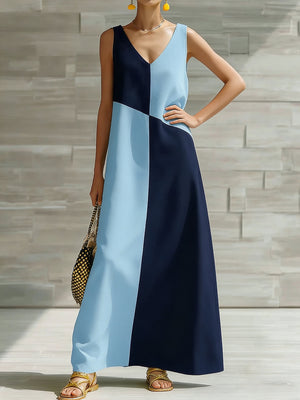Geometric v-neck maxi dress in light blue and navy with colorblock pattern.