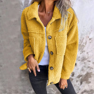Textured sherpa utility jacket in mustard with button front and chest pockets.