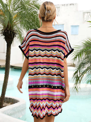 Chevron knit beach cover-up with multicolor stripes and black trim.