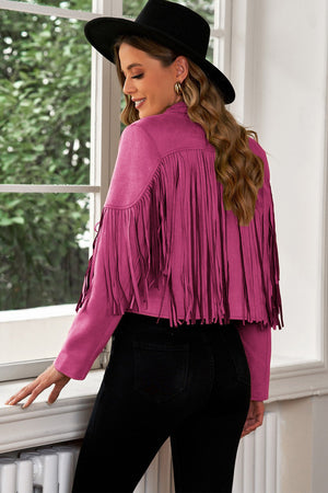 Hot Pink suede cropped jacket with fringe details and long sleeves.