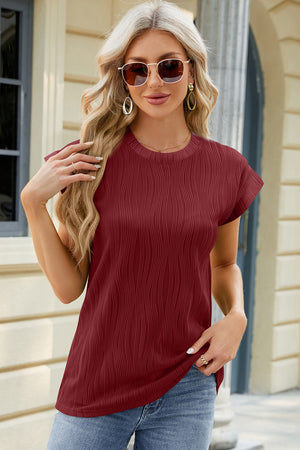 Burgundy textured cap sleeve top with a crew neck and vertical ribbing detail.