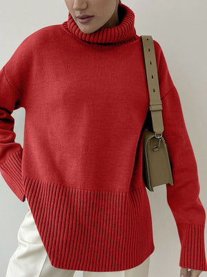 Deep Red ribbed turtleneck sweater with flared sleeves and ribbed hem detail.