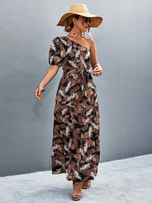 Tropical print one-shoulder maxi dress with balloon sleeves and tie waist.