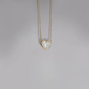 Bezel-set heart diamond solitaire necklace on 18K gold-plated chain