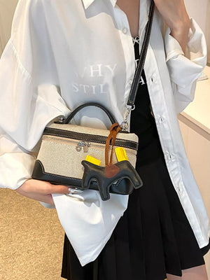 Top Handle Detachable Strap Mini Handbag in Black, model styling view