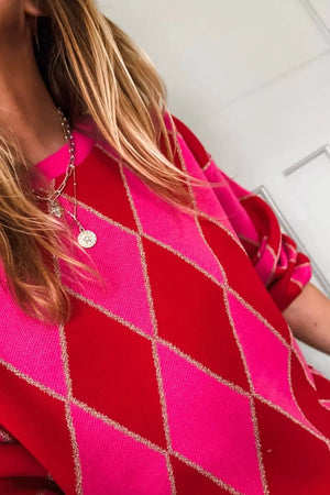 Vibrant argyle knit sweater in red and deep rose with gold sparkle detail.