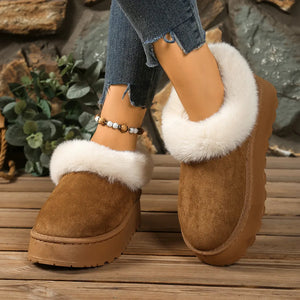 Cozy khaki platform slippers with fuzzy white trim and chunky sole.