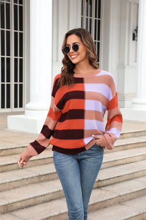 Pastel block stripe crewneck pullover sweater in orange, blush pink, and khaki with a relaxed fit.