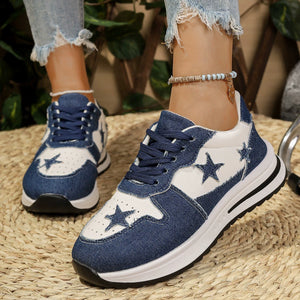 Blue and white denim lace-up sneakers with star embellishments and a chunky sole.