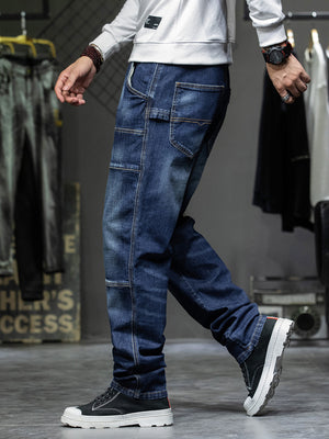 Men's dark blue 100% cotton cargo jeans with relaxed fit and visible pocket details.