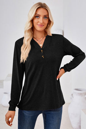 Black henley neckline jersey top with button detail and long sleeves.