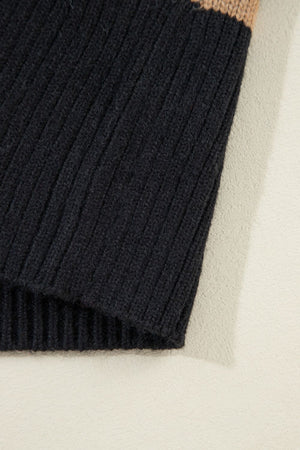 Chunky knit black cardigan with a tan stripe detail.