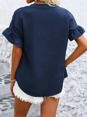 Dark blue blouse with ruffle short sleeves and gathered yoke detail.