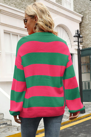 Green and pink striped oversized knit sweater with balloon sleeves.