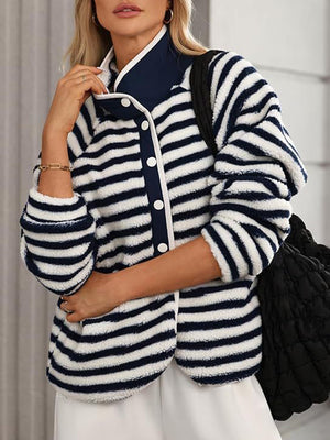 Sherpa button-up jacket with navy and white stripes, white trim, and navy collar.