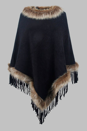 Black textured knit poncho with faux fur trim and fringe details