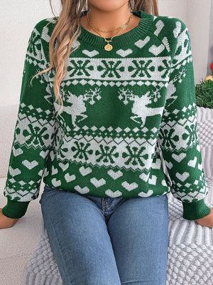 Green acrylic sweater with white reindeer and snowflake jacquard pattern.