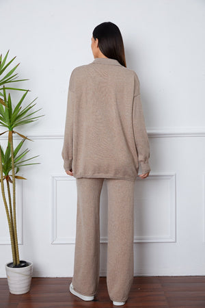 Khaki knit polo co-ord set with relaxed fit sweater and wide leg pants.
