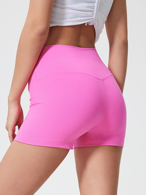 Nova Rise High-Motion Shorts in Fuchsia Pink, seamless high-waisted activewear shorts with a V-seam detail.