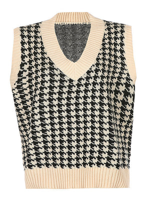 Houndstooth knit v-neck tank top in black and beige with ribbed trim.