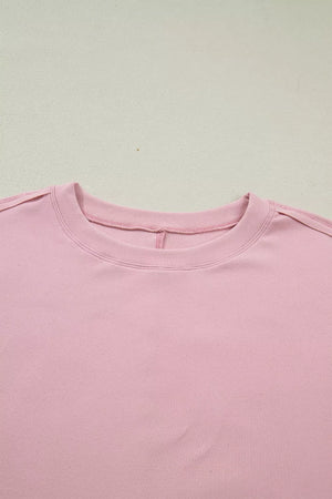 Pink maternity t-shirt with crew neck and lace sleeves detail
