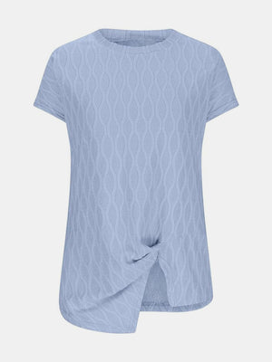 Light blue textured tee with short sleeves and a knot-front asymmetric hem.