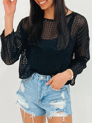 Black open-knit slouchy sweater with crew neck and bell sleeves.