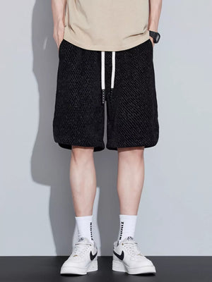 Black textured boxer shorts with adjustable drawstring waist
