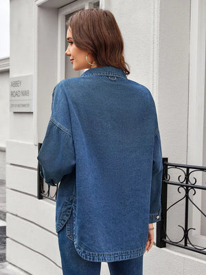 Denim trucker jacket in blue wash with button-down front and chest pockets.