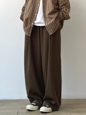 Men's chocolate relaxed fit flowy sweatpants with wide leg and elastic waist.