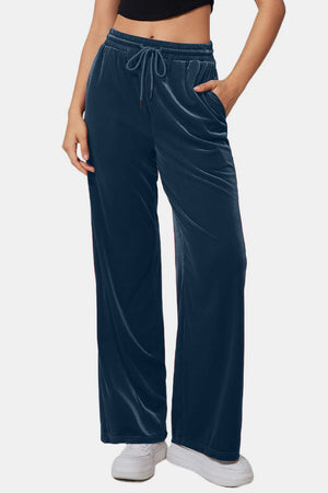 Deep Teal velvet palazzo lounge trousers with drawstring waist and pockets.