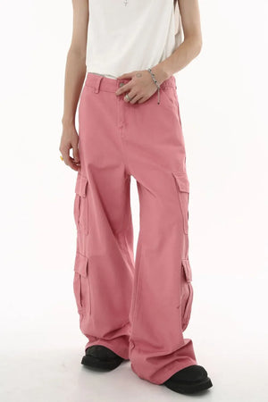 Oversized dusty pink cargo palazzo pants with multiple pockets and a button front.