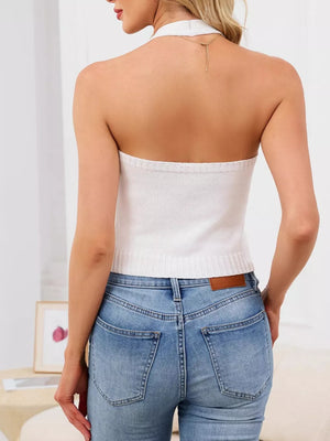White halter neck knit vest with button detail, cropped length, polyester