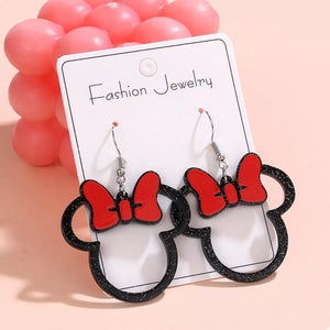 Mickey Mouse inspired bow drop earrings in red and black acrylic with glitter detail.