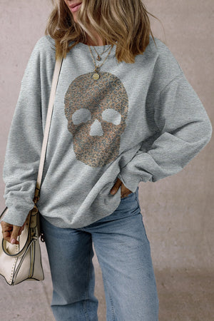 Gray cotton sweatshirt with embellished skull motif and crew neck.