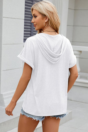 White hooded t-shirt with rolled short sleeves and a relaxed fit.