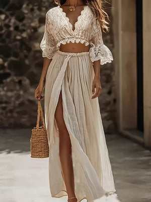 Lace crop top with bell sleeves and high slit maxi skirt set in cream