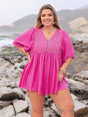 Hot Pink eyelet yoke romper with flutter sleeves and lace trim.