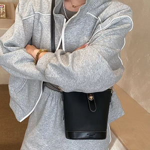 Bucket Leather Crossbody Bag in Black, side view
