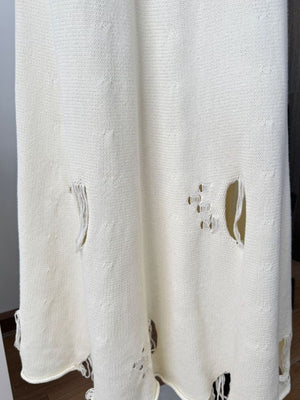 Off white distressed cotton sweater set with deconstructed details and frayed edges.