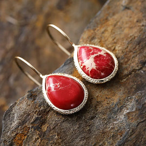 Deep Red marbled gemstone teardrop earrings with bezel setting and gold-plated hooks.