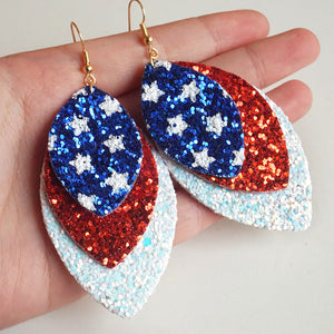 Patriotic layered glitter earrings with stars in red, white, and blue.