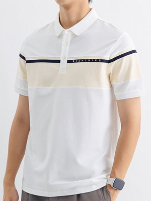 Men's white cotton polo with color block detail and navy stripe.