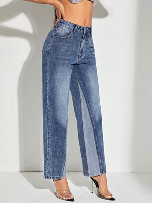 Panelled denim straight leg jeans in medium wash cotton with a button fly.