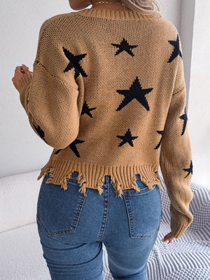 Camel knit sweater with black stars and distressed hem