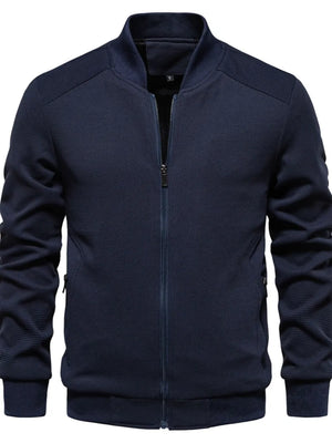 Navy textured knit bomber jacket with zip front and ribbed cuffs.