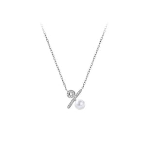 Silver necklace with percentage pendant, cubic zirconia accents, and pearl drop.