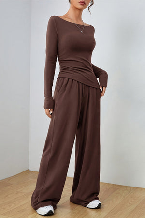 Brown boat neck loungewear set with ruched side detail and wide leg pants.