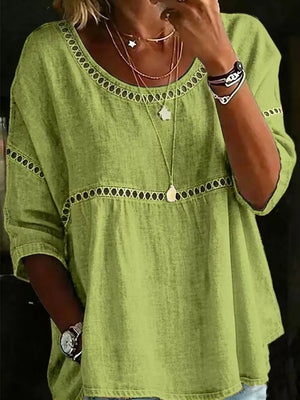 Light green bohemian t-shirt with openwork detail at neckline and waist, 3/4 sleeves